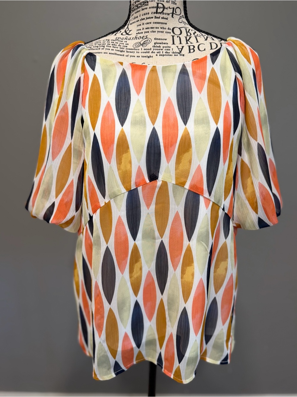 Harper White Top with Orange Accent